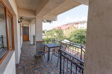 Фото номера Двухместный номер с 1 кроватью и террасой Гостевой дом Casa Sarofin г. Костинешти 7