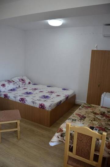 Фото номера Двухместный номер с 1 кроватью и террасой Гостевой дом Casa Sarofin г. Костинешти 5