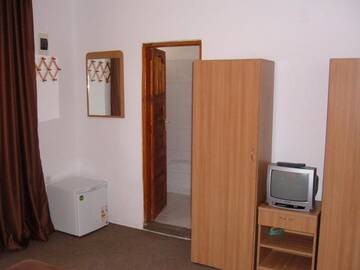 Фото номера Трехместный номер с собственной ванной комнатой Гостевой дом Mario Residence г. Костинешти 11