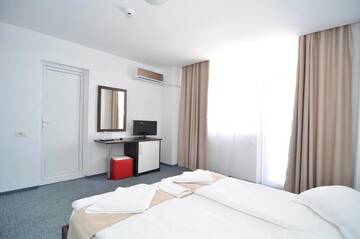 Фото номера Двухместный номер с 1 кроватью Гостевой дом Babylonia Resort г. Костинешти 6