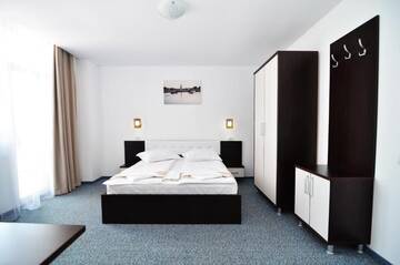 Фото номера Двухместный номер с 1 кроватью Гостевой дом Babylonia Resort г. Костинешти 7