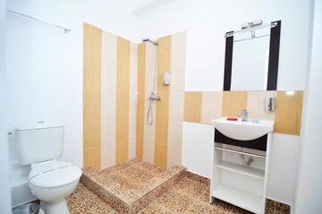 Фото номера Двухместный номер с 1 кроватью Гостевой дом Babylonia Resort г. Костинешти 8