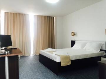 Фото номера Двухместный номер с 1 кроватью Гостевой дом Babylonia Resort г. Костинешти 5