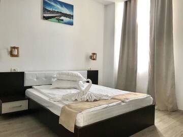 Фото номера Двухместный номер с 1 кроватью Гостевой дом Babylonia Resort г. Костинешти 6