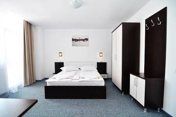 Фото номера Двухместный номер с 1 кроватью Гостевой дом Babylonia Resort г. Костинешти 4