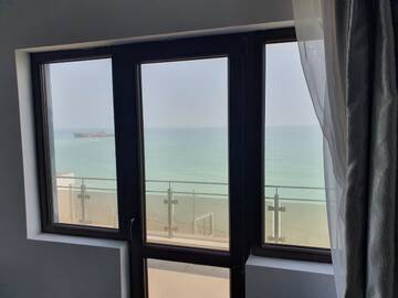 Фото номера Семейный номер с видом на море Проживание в семье Premium Sea View *** г. Костинешти 3