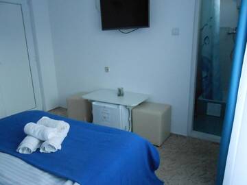 Фото номера Двухместный номер с 1 кроватью Гостевой дом VILA ANKARA г. Костинешти 3