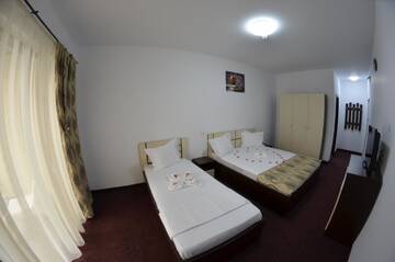Фото номера Номер-студио с балконом Гостевой дом Razvan Holiday г. Костинешти 5